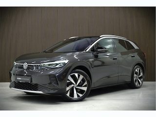 Volkswagen ID.4 First 77 kWh | Stoelverwarming | Stuurverwarming | Adaptive Cruise Control | Navigatie | Apple Carplay | Keyless | Camera | Parkeersensoren | NAP | BTW | SOH 92,01%