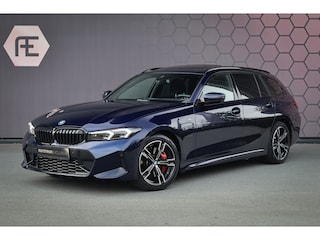 BMW 3-serie Touring 330e | 25MY | LCI FACELIFT | BTW-AUTO | ELEK. HAAK | HEAD UP | HARMAN & KARDON | SFEERVERLICHTING | 360 CAMERA | MEMORY SEATS | PANO |