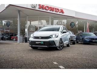 Honda Jazz 1.5 Full Hybrid Advance | Premium Sunlight Silver | verwarmd stuurwiel | Adaptieve cruise control | stoelverwarming | privacy glass
