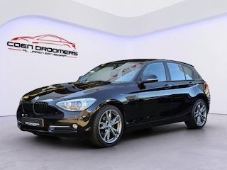 BMW 116i Business+ Sport /Apple Carplay/Navigatie/Verwarmde Sportstoelen/Cruise Control/Bi-Xenon/Parkeersensor Achter/18" LMV/(MET GARANTIE)
