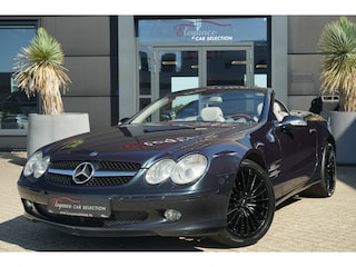 Mercedes-Benz SL 500 | 306PK | Designo | Bose | Leder | Stoelverwarming | 19" | Mercedes-Benz SL-Klasse 500 306 PK met 5.0 V8 benzinemotor, Designo lak, Bose audiosysteem, navigatie, 19-inch lichtmetalen velgen, lederen interieur, elektrisch verstelbare stoelen met geheu