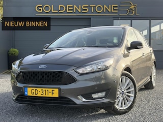 Ford Focus 1.5 Titanium Edition ✓150pk✓Navi✓Clima✓Cruise✓6 Bak✓Pdc V+A✓17'' Lm velgen✓N.A.P✓Apk tot 11-2027