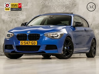BMW M135 M135i xDrive High Executive Automaat 320Pk (GROOT NAVI, SCHUIFDAK, ALCANTARA STUUR, AKRAPOVIC UITLAATSYSTEEM, LEDER, NIEUWE APK)