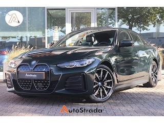 BMW i4 (g26) eDrive40 M-Sport 340pk SoH 94% | Pano | Laser | Carbon | Camera | Stoelverwarming | Harman/Kardon | HUD |