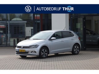Volkswagen Polo 1.0 TSI Comfortline 15" lmv pdc voor en achter spiegel pakket navigatie privacy glas licht en regensensor 4 seizoenen banden ACC stoelverwarming