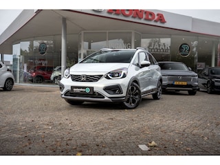 Honda Jazz 1.5 Full Hybrid Automaat Advance Crosstar | Premium Sunlight White | 8 jaar garantie | Nieuwe auto | Adaptieve cruise | Climate control | Carplay