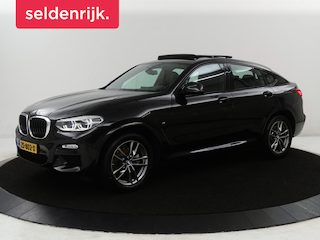 BMW X4 xDrive20i High Executive Edition M-sport | Panoramadak | Leder | Trekhaak | Camera | Sfeerverlichting | Stoelverwarming | Full LED | Climate control | Park assist | Cruise control |