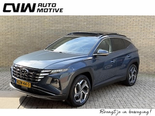 Hyundai Tucson 1.6 T-GDI 265 PHEV Premium Sky 4WD | Panoramadak | Trekhaak afneembaar | Lederen bekleding | Memory | 360 camera | Stoelverwarming&ventilatie | Stuurverwarming | Adaptieve cruise | Navigatie | LED | DAB | Apple CarPlay | Elektrische achterklep | Dealeronderhouden | Fabrieksgarantie