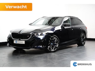 BMW i5 Touring M60 xDrive 84 kWh | Harman & Kardon | Trekhaak | Stoelverwarming | 20 Inch | Adaptief LED | Elektr. Klep | Carplay | Navi |