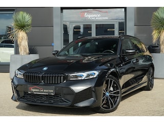 BMW 3-serie Touring 320e | 204 PK | M Sportpakket | Panoramadak | Head-up display | Achteruitrijcamera | BMW 3 Serie Touring 320e M Sport met 2.0 viercilinder benzinemotor en plug-in hybride aandrijving, voorzien van panoramadak, Head-up display, navigatiesysteem, Apple CarPlay/Android Auto, Par