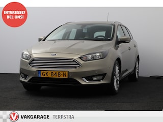 Ford Focus Wagon 1.0 Titanium Edition/ Voorruitverw./ 17'' LMV/ PDC V+A/ Navi/ Clima/ Cruise/ Elek. pakket/ Isofix/ Bluetooth/ Armsteun/ Multi. LEDER. Stuur/ Mistl./ Chroom/ Dakrails.