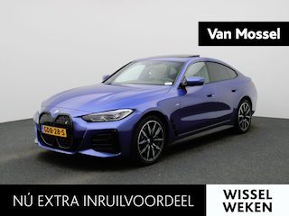 BMW i4 eDrive35 M-Sport 70 kWh | Panoramadak | Oyster Leder | Stoelverwarming | Apple Carplay / Android Auto | Climate Control | Adaptive Cruise Control | Camera | Virtual Cockpit | Lichtmetalen M-Sport Velgen | Elektrische Achterklep |