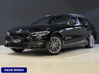 BMW 3-serie Touring 330e Business Edition Plus | Vol leder | Elektr. trekhaak | Harman/Kardon