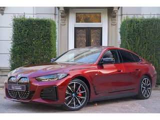 BMW i4 M50 High Executive 84 kWh PANO | KUIPSTOEL | H&K | 360 CAM | CARBON | DR. ASSIST PRO | INDIVIDUAL