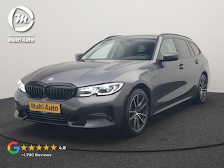 BMW 3-serie Touring 320e xDrive Sportline PHEV 204pk Dealer O.H | Trekhaak Af Fabriek | Camera | Laser LED | Cruise Control | Lederen Sportstoelen Verwarmd | Keyless | Sfeerverlichting | Apple Carplay | BLIS | Virtual | Navigatie | DAB | 18"L.M | Plug In Hybrid |