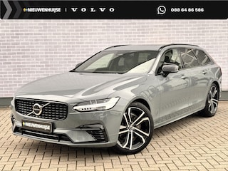 Volvo V90 2.0 T6 Plug-in Hybrid AWD Plus Dark | PHEV Long Range | Luchtvering | Panoramadak | Harman Kardon Audio | Trekhaak | Sportstoelen | Keyless Entry | Elektrische Achterklep | Elektrisch Verstelbare Voorstoelen | Stoelverwarming | Lichtmetalen Velgen 20 inch | Navigatie | Apple Carplay | Android Auto