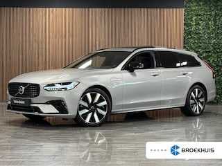 Volvo V90 T6 AWD Recharge Ultra Ultimate Dark | Bowers & Wilkins | Luchtvering | Schuifdak | 360 Camera | Head-Up Display | Adaptieve Cruise Control | Stoel en stuurwielverwarming | 19 Inch | Full LED Meesturende koplampen | Pilot Assist | BLIS Dode Hoek Detectie | Elektrische voorstoelen geheugen | R-Design Contour Stoelen met wit stiksel en bies | Zitting verlenging voorstoelen | Lederen Dashboard | Google Infotainment | Keyless Drive | Parkeersensoren voor+achter | Privacy Glass | Elektrisch bedienbare achterklep | Geïntegreerde kinderzitjes achterin | Geïntegreerde zongordijnen achterportieren | DAB Radio | Alarm Klasse III | Apple Carplay/Android Auto | Volvo On Call met mobiele App functie | Silver Dawn Metallic |
