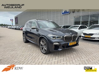 BMW X5 M50d High Executive GRIJS KENTKEN M-PAKKET I 22" I Pano I Leder I Head-Up I Winterpakket I Laser I 360 Camera I B&W I