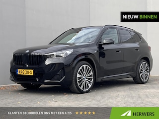 BMW X1 xDrive30e / Dealer onderhouden / Accu SoH 96 % / M-SPORT / 240 KW Plug In / 1.800 kg Elektrische trekhaak / Leder / HUD / Camera 360° / Stuur- & stoelverwarming / Navi / Apple Carplay Android / 18" LM wielen /