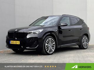 BMW X1 xDrive30e / Dealer onderhouden / Accu SoH 96 % / M-SPORT / 240 KW Plug In / 1.800 kg Elektrische trekhaak / Leder / HUD / Camera 360° / Stuur- & stoelverwarming / Navi / Apple Carplay Android / 18" LM wielen /