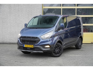 Ford Transit Custom 300 2.0 TDCI L1H1 Trail BJ2022 Lmv 16" (Zwart) | Led | Pdc | Trekhaak | Verwarmde voorruit | Achteruitrijcamera | Navi | Airco | Cruise control | Lederen bekleding | Verwarmde voorstoelen