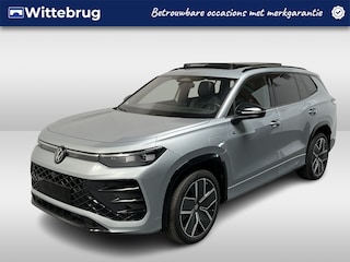 Volkswagen Tayron 1.5 eHybrid R-Line Edition / FABRIEKSGARANTIE TM 11-2030/ 272 PK/ TREKHAAK/ PANO/ LEER/ 360 CAMERA/ BLACK STYLE/ HARMAN/KARDON/ / HEAD-UP/ IQ. LIGHT/ STOELVENTILATIE/ APP CONNECT/ STOELVERWARM. V&A/ DODE HOEK/ KEYLES