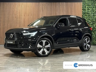Volvo XC40 T5 Recharge Ultimate Dark | Trekhaak | Schuifdak | Harman Kardon | Parkeercamera | All Season banden | Adaptieve Cruise Control | Pilot Assist | BLIS Dode Hoek Detectie | Bestuurdersstoel elektrisch geheugen | Stoel en Stuurwielverwarming | Privacy Glass | 19 Inch | Passagiersstoel elektrisch | Microtech / alcantara bekleding met wit stiksel en bies | Zitting verlenging voorstoelen | Keyless Drive | Parkeersensoren voor+achter | Privacy Glass | Elektrisch bedienbare achterklep | Climate Control L+R | DAB Radio | Apple Carplay/Android Auto | Volvo On Call met mobiele App functie | Onyx Black Metallic |