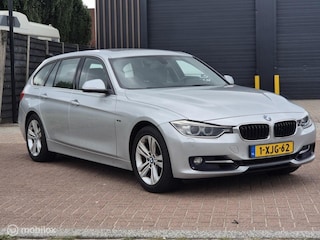 BMW 3-serie Touring 320i High Executive
