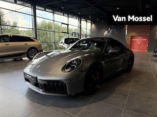 Porsche 911 3.6 T-Hybrid Carrera GTS | SPORTDESIGN | SPORTCHRONO | SPORUITLAATSYSTEEM | PTV + | PASM | PDLS + | BOSE | HEFSYSTEEM VOORAS | ACHTERASBESTURING | 18-WEG STOELEN | PANORAMA/SCHUIF-KANTELDAK | STOELVENTILATIE | VANADIUMGRIJS |