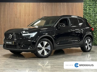 Volvo XC40 T5 Recharge Plus Dark | Trekhaak | Harman Kardon | Parkeercamera | All Season banden | Adaptieve Cruise Control | Pilot Assist | BLIS Dode Hoek Detectie | Bestuurdersstoel elektrisch geheugen | Stoel en Stuurwielverwarming | Privacy Glass | 19 Inch | Passagiersstoel elektrisch | Zitting verlenging voorstoelen | Keyless Drive | Parkeersensoren voor+achter | Privacy Glass | Elektrisch bedienbare achterklep | Climate Control L+R | DAB Radio | Apple Carplay/Android Auto | Volvo On Call met mobiele App functie | Onyx Black Metallic |