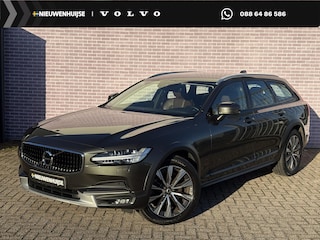 Volvo V90 2.0 T5 AWD Pro | Pine grey metallic | Maroonbrown Nappa leder | Black Walnut Wood |Trekhaak | Adaptieve cruise control | Camera | Alarm | BLIS | Parkeersensoren |