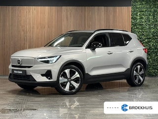 Volvo XC40 Recharge Plus 70 kWh | 96% SoH | All-season banden | Adaptieve Cruise Control | Stoel en Stuurwielverwarming | Parkeercamera | BLIS Blind Spot Information System | Pilot Assist | 19 Inch | R-Design microtech/alcantara bekleding met wit stiksel en bies | Zitting verlenging voorstoelen | Warmtepomp | Google Infotainment | Keyless Drive | Privacy Glass | Parkeersensoren voor+achter | Elektrisch bedienbare achterklep | DAB Radio | Apple Carplay/Android Auto | Volvo On Call met mobiele App functie | Silver Dawn Metallic |