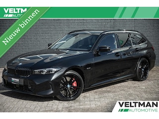 BMW 3-serie Touring 320e PANORAMADAK TREKHAAK ADAPTIVE CRUISE CARPLAY