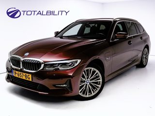 BMW 3-serie Touring 320e Business Edition Plus | Camera | PDC V+A | Elec. achterklep | Cruise | Navigatie pro | Afn.Trekhaak Apple carplay/Android auto, Lederen bekleding, 18"LMV