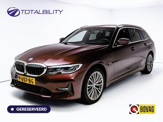 BMW 3-serie Touring 320e Business Edition Plus | Camera | PDC V+A | Elec. achterklep | Cruise | Navigatie pro | Afn.Trekhaak Apple carplay/Android auto, Lederen bekleding, 18"LMV