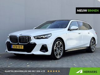 BMW i5 Touring eDrive40 M Sport Edition 84 kWh / Panorama dak / HUD / Camera 360° / Leder / Bowers & Wilkins audio / Elektrische stoelen en klep / Stoelventilatie / Stuur- en stoel- & verwarming / Apple Carplay Android / 19" LM wielen /