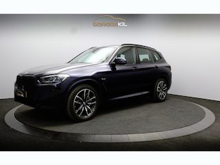 BMW X3 xDrive30e High Executive Panorama dak / Elektr. Stoelen / Memory / HUD / Achteruitrijcamera / Trekhaak / Laser koplampen / Lichtmetalen velgen / Buitenspiegel verwarmbaar + Elektr. Verstelbaar