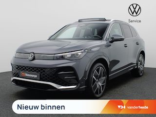 Volkswagen Tiguan 1.5 eHybrid R-Line 204PK DSG SOH 99,97%, Panoramadak, Achteruitrijcamera, 20" LM Velgen, Keyless, Elektr. Achterklep, Side Assist, Stoel-Stuurverwarming, Navi via Apple Carplay/Android Auto