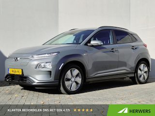 Hyundai Kona EV Fashion 39 kWh / SOH 94% / Dealer onderhouden / CCS snelladen / Achteruitrijcamera / Warmtepomp / Head Up Display / Apple Carplay Android Auto / Draadloze telefoon lader / Krell Audio Systeem / Keyless Entry/Start /