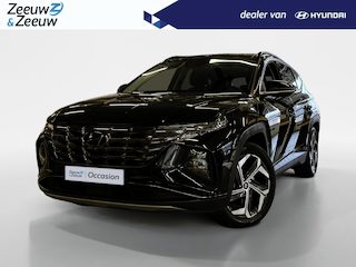 Hyundai Tucson 1.6 T-GDI PHEV Premium Sky 4WD 265PK | 66km WLTP elektrisch | Navigatie | Adaptive cruise control | Trekhaak | Apple Carplay & Android Auto | Dode hoek detectie | Draadloze telefoonlader |