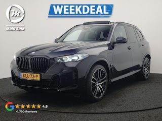 BMW X5 xDrive50e High Executive PHEV 490pk Dealer O.H. | Panodak Sky Lounge | M Sport | Luchtvering | Head Up | 360 Camera | Harman / Kardon | Nappa Lederen Comfortstoelen Memory & Verwarmd | Carbon Schwarz | Apple Carplay | Keyless | Blis | 22"L Plug In Hybrid |