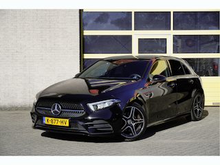 Mercedes-Benz A-klasse 180 Automaat! 5drs AMG Business Solution BJ2021 Lmv 18" | Led V+A | Pdc | Sideskirts | Achteruitrijcamera | Virtual cockpit | Sfeerverlichting | Climate control | Cruise control | Sportstoelen | Sportstuur | Verwarmde voorstoelen | Zwarte hemel