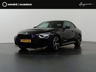 BMW 2-serie Coupé 218i | M-Pakket | HUD | Stuur/stoelverwarming | Curved Display | Sportstoelen | Camera | DAB | Adaptieve Cruise Control |