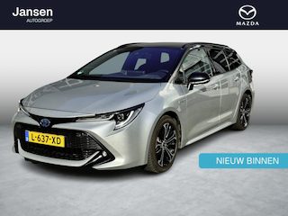 Toyota Corolla Touring Sports 1.8 Hybrid Dynamic two-tone, trekhaak, all weather banden, achteruitrijcamera, navigatie, enz.
