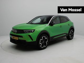 Opel Mokka Ultimate 50-kWh 11kw bl. | Camera | Alcantara | 18" Bi-color velgen | Zeer compleet!