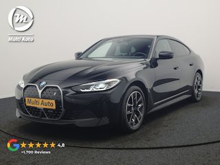 BMW i4 eDrive 35 70 kWh 286pk Dealer O.H | SOH 96,3% | Adaptive Cruise | Camera | Lederen Sportstoelen Verwarmd | Apple Carplay | Keyless | Navigatie | Virtual | DAB | 18"L.M |