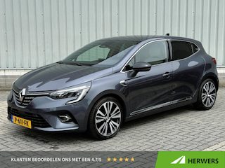 Renault Clio E-Tech Hybrid 140PK Initiale Paris / BOSE Premium Audio / Lederen Bekleding / Stoel & Stuurverwarming / Apple Carplay & Android Auto / All Season Banden / Trekhaak / Navigatie / Achteruitrijcamera /