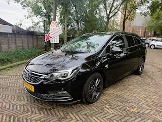 Opel Astra Sports Tourer 1.4 Turbo 120 Jaar Edition, carplay.Wij zijn altijd de goedkoopste met de beste Vakgarage BOVAG service.