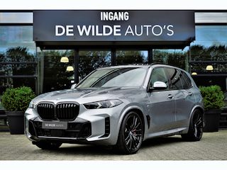 BMW X5 xDrive50e M-sport Pano 4-wielsturing SoftClose Trekhaak Harman/Kardon Carbon