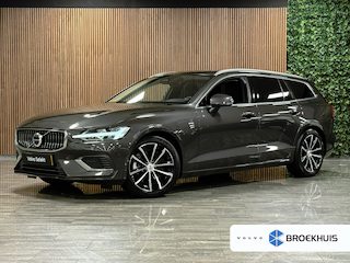Volvo V60 T6 AWD Recharge Bright Long Range | Adaptieve Cruise Control | Stoelverwarming voor+achter | Stuurwielverwarming | Parkeercamera | Pilot Assist | BLIS Dode Hoek Detectie | Lederen bekleding | 18 Inch | Google Infotainment | Keyless Drive | Parkeersensoren voor+achter | Privacy Glass | Elektrisch bedienbare achterklep | Automatisch dimmende binnen en buitenspiegels | DAB Radio | Apple Carplay/Android Auto | Volvo On Call met mobiele App functie | Platinum Grey Metallic |